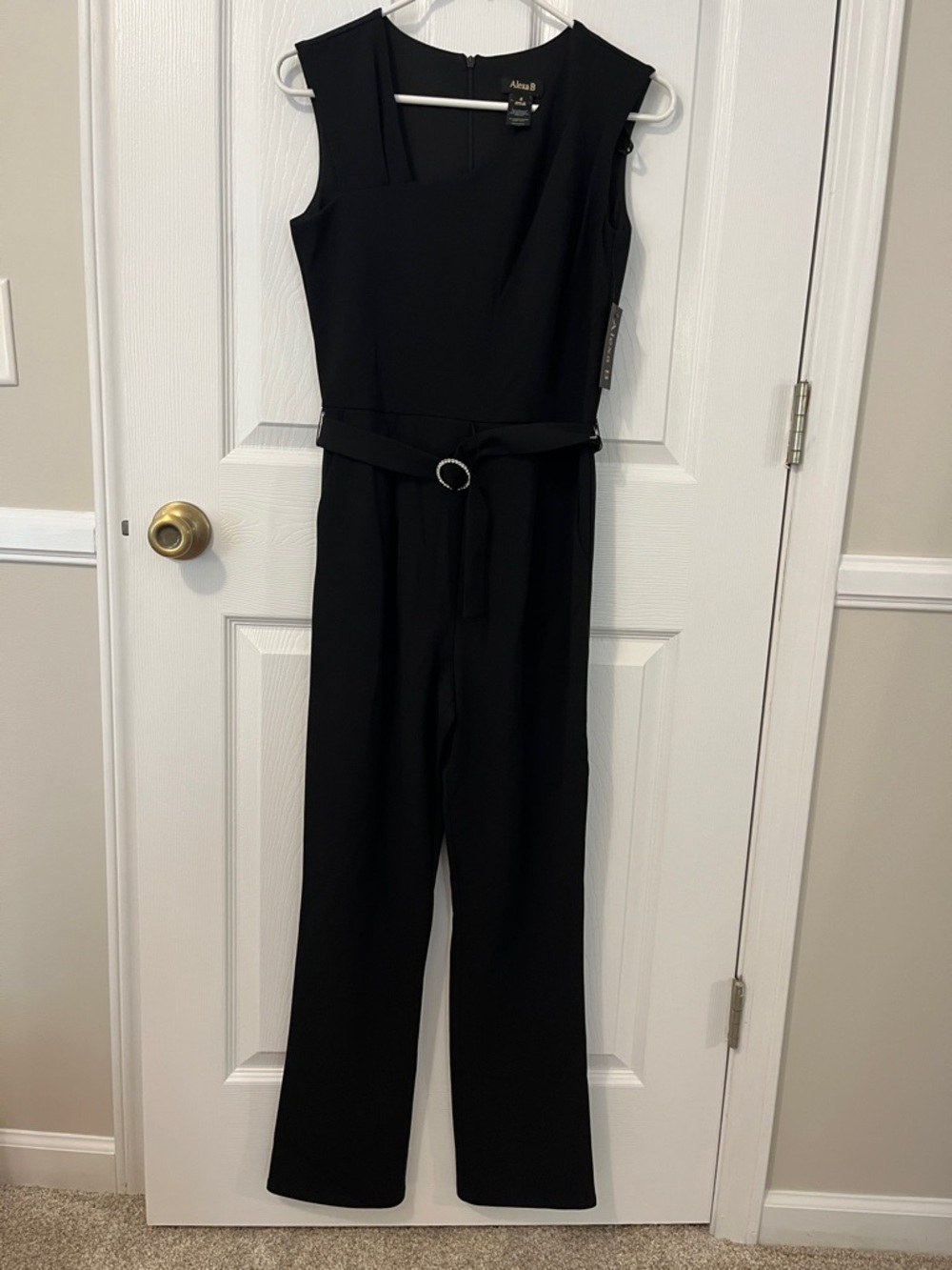 Alexa B Black Sleeveless Belted straight Leg Jumpsuit
New with tag
Size 4